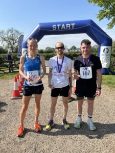 Overall half-marathon podium: Zoe Kemp, winner Matt Langtree and Sam Russell