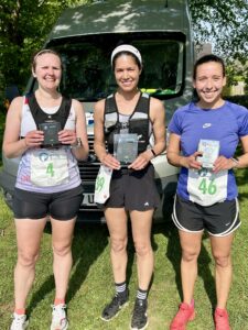 Women's 10k podium: Samantha Baines, winner Carli Palmer and Kate Sidwell