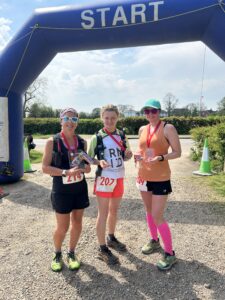 Women's three-quarter marathon podium: Winner Amy Sarkies, Charlotte Marshall and Katherine Rowney