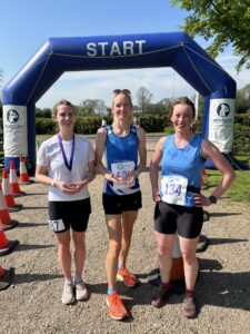 Women's half-marathon podium: Becky Hampshire, winner Zoe Kemp and Kate Wales